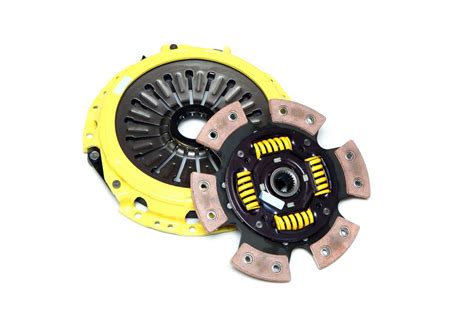 Immagine comparativa tra una frizione scooter originale e una aftermarket ad alte prestazioni