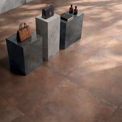 dettaglio dei rivestimenti in gres effetto corten e pietra naturale
