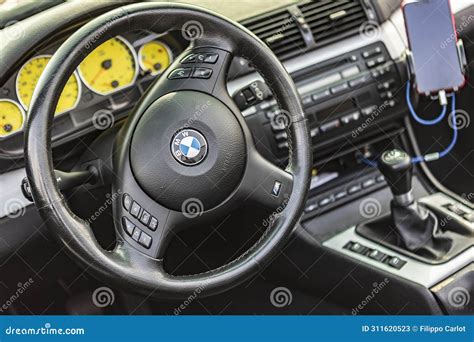 BMW E46 dashboard with navigation screen