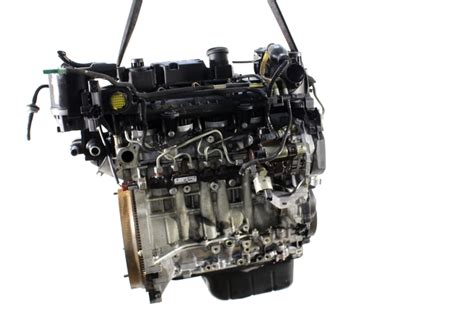 Motore Ford Fiesta F6JB con iniettori evidenziati