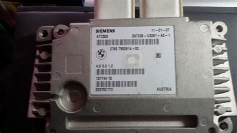 Centralina BMW E90 nel baule con logo Bluetooth
