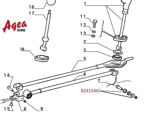 Un meccanico che controlla il leveraggio del cambio di una Fiat Panda