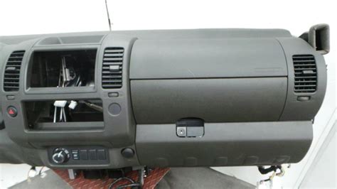 Nissan Navara D40 dashboard with an aftermarket radio installed