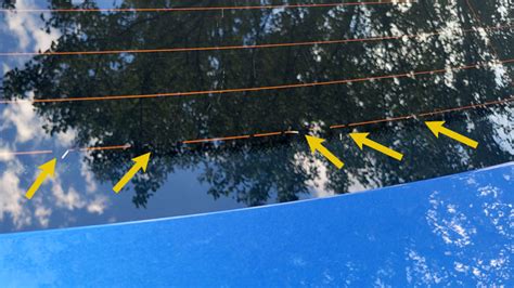 Rear window defroster lines with antenna integrated