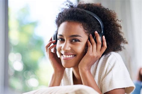 Person listening to radio with headphones