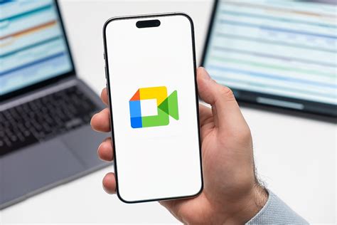Google Meet mobile app interface with microphone