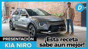 Kia Niro con finestrini aperti sotto la pioggia