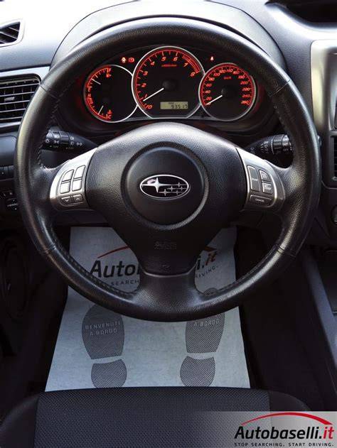 Volante Subaru Impreza con comandi