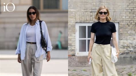 Donna con fianchi larghi sorridente che indossa un outfit elegante