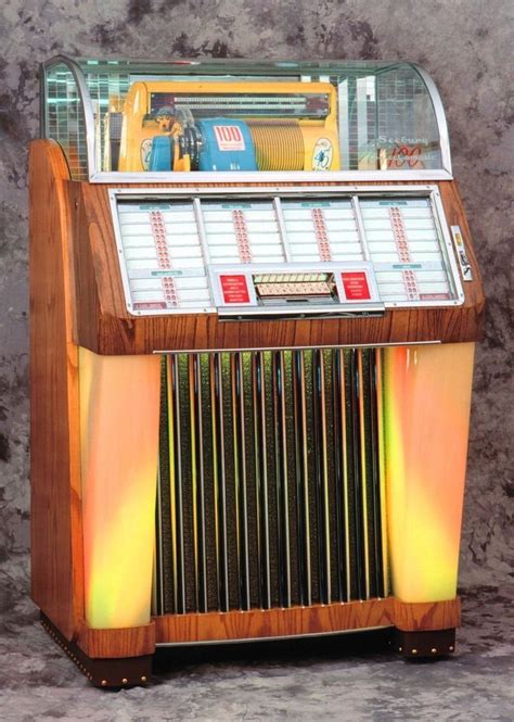 Un jukebox vintage illuminato con dischi impilati