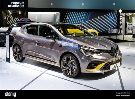Renault Clio E-Tech full hybrid driving through the streets of Valencia