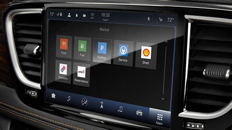 Schermata del sistema Uconnect 5 pollici con icone di navigazione e multimedia