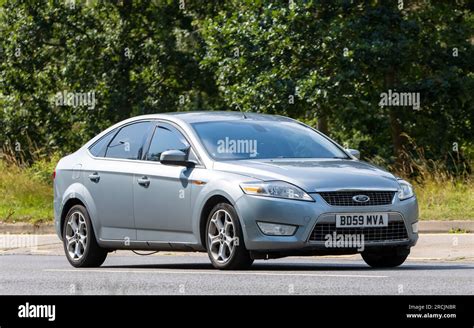 Ford Mondeo driving on a scenic road