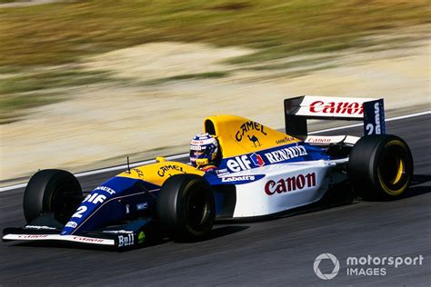 Alain Prost con la Williams FW15C