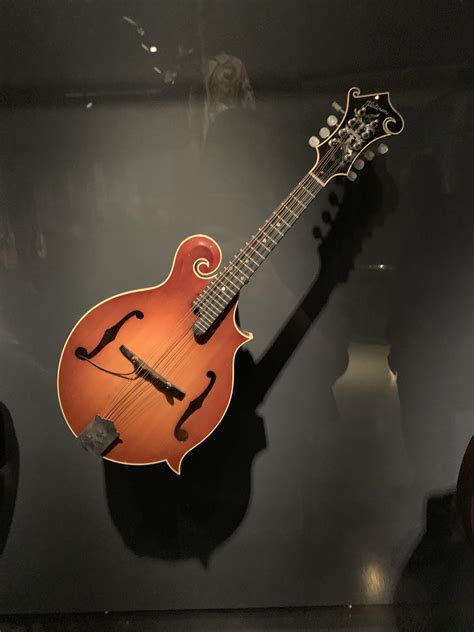 Peter Buck playing mandolin