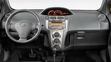 Interior of a Toyota car showing a child seat and the dashboard
