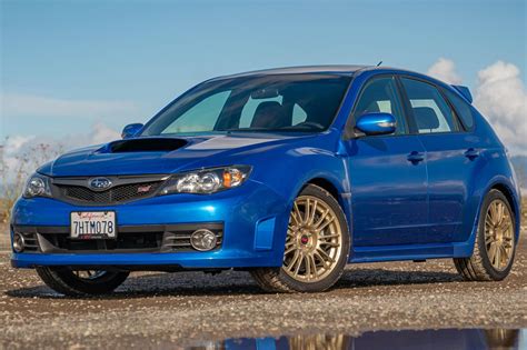 Interno Subaru Impreza III Hatchback WRX STI con cruscotto