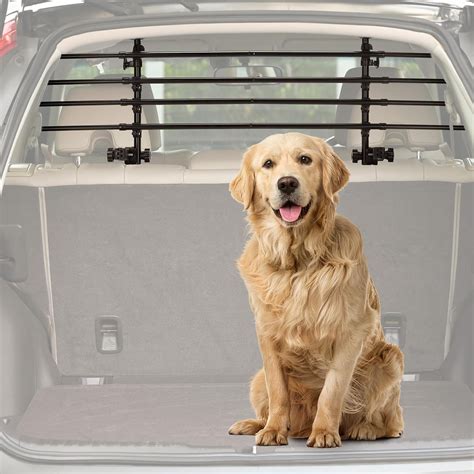 Griglia divisoria per cani Travall in un bagagliaio Dacia