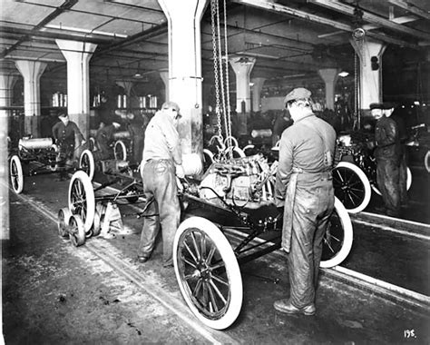 Historic photo of the first Zhiguli car rolling off the assembly line