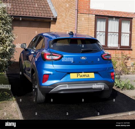 Ford Puma close-up on a metallic blue paint finish