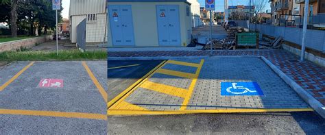 Segnaletica orizzontale di un parcheggio per disabili