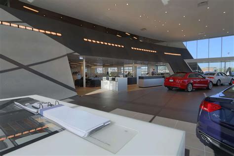 Audi dealership interior with a focus on customer service and financing options