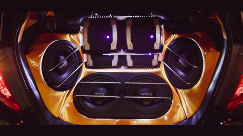 Schema di un impianto audio completo per auto con amplificatore e subwoofer