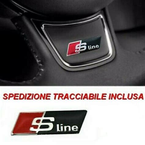 Dettaglio di un ricambio originale Audi con logo