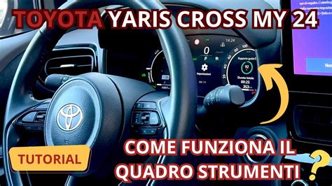Immagine di un quadro strumenti di una Toyota Yaris con pulsanti di regolazione
