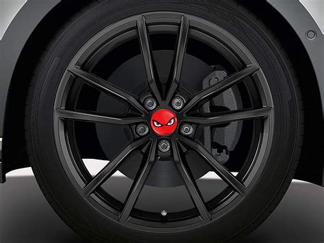 Coprimozzi cromati con bordo rosso per cerchi Peugeot
