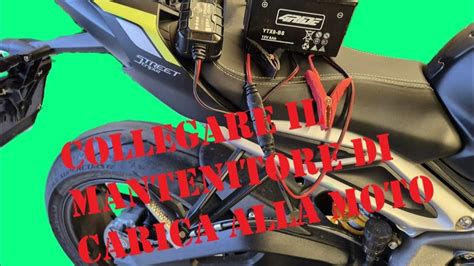 Connessione del caricabatterie alla moto tramite presa DIN