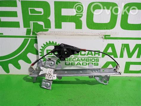 schema esploso meccanismo alzacristalli portiera anteriore Ford Fiesta