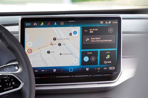 Smartphone display mirrored on car infotainment screen with large icons for navigation, music, and calls