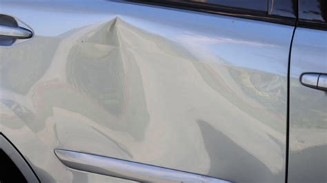 Maniglia portiera auto danneggiata