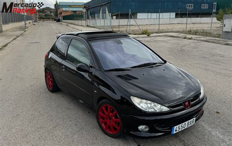 Peugeot 206 GTI con cerchi dorati