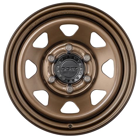 Dettaglio del design DOTZ Dakar in bronzo