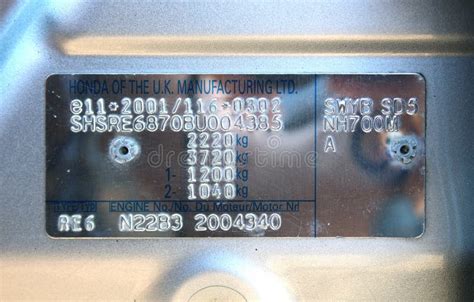 Close-up of a VIN plate on a car chassis