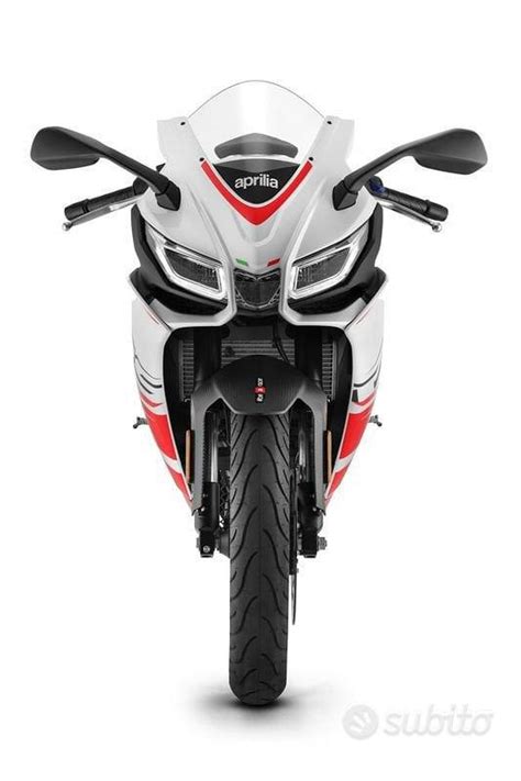 Logo Aprilia e dati di contatto di Tartarelli Motorcycles