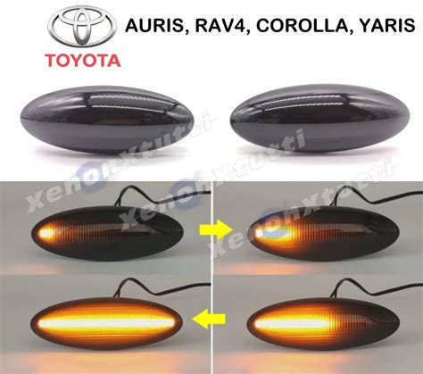 Diagramma di un'auto Toyota RAV4 con frecce laterali evidenziate