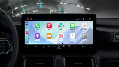 Interfaccia Apple CarPlay sul display dell'auto