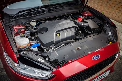 Ford Mondeo engine bay with headlight access