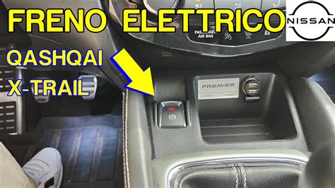 Nissan Qashqai J11 interno con dettaglio interruttore freno di stazionamento