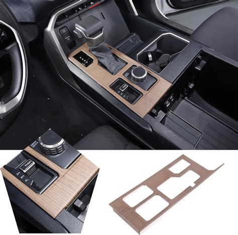 Central console of a car with gear shifter and removed trim