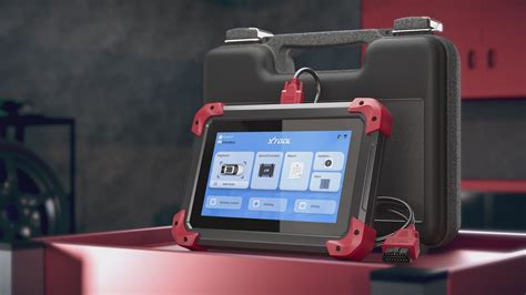 Tecnico che collega uno scanner diagnostico a un'automobile