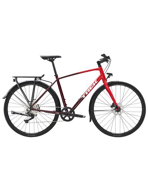 Bicicletta ibrida equipaggiata per il pendolarismo con borse e parafanghi