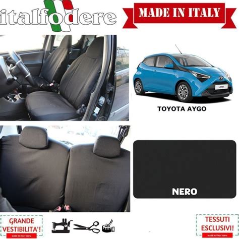 Interno di una Toyota Aygo con tappetini su misura