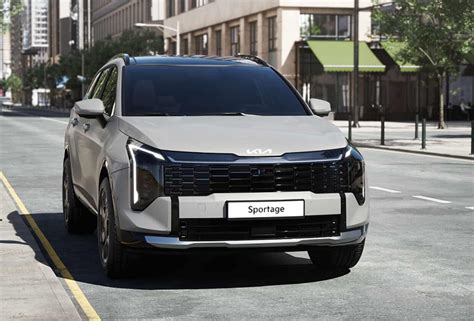 Kia Sportage su strada innevata con catene