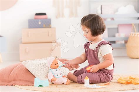 Bambola Corolle con accessori per la pappa