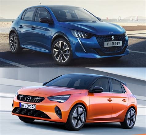 Opel Corsa e Peugeot 208 affiancate su strada cittadina