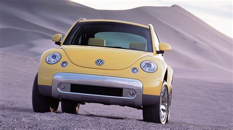 Volkswagen New Beetle con cerchi in lega e coprimozzi